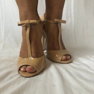 Nude T strap peep toe heels with bow